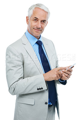 Buy stock photo Studio portrait of a mature businessman using a cellphone isolated on white