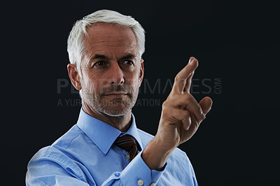 Buy stock photo Business man, finger and future interface for choice isolated on a black studio background. Touch, professional and hand gesture on screen, click button and innovation of technology for senior CEO