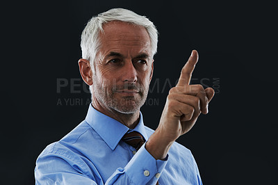 Buy stock photo Business man, finger and interface for choice isolated on a black studio background. Touch, professional and hand gesture on screen, click and future innovation of digital technology for senior CEO