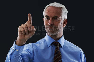 Buy stock photo Business man, finger and digital interface for choice isolated on a black studio background. Touch, professional and hand gesture on screen, click button and future innovation of tech for senior CEO