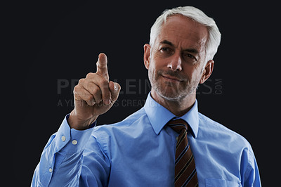 Buy stock photo Business man, finger or click interface for choice isolated on black studio background. Touch, professional or hand gesture on screen, press button or future innovation of digital tech for senior CEO