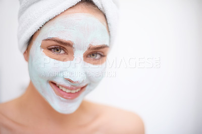 Buy stock photo Women, face mask and skin care for portrait, bathroom and acne for organic rejuvenation. Female person, towel and smile with treatment, wellness and spa day for beauty and relaxation for hygiene