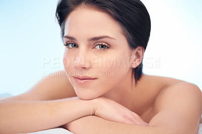 Buy stock photo Skincare, relax or face of woman in studio isolated on blue background for wellness in spa or salon. Smooth, anti aging or natural results of model, lady or confident person with shine, youth or glow