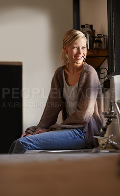 Buy stock photo Portrait, young woman and relax at home on the kitchen counter in Australia on the weekend. Rest, female person and face for calm house and lifestyle with peaceful and casual fashion or style