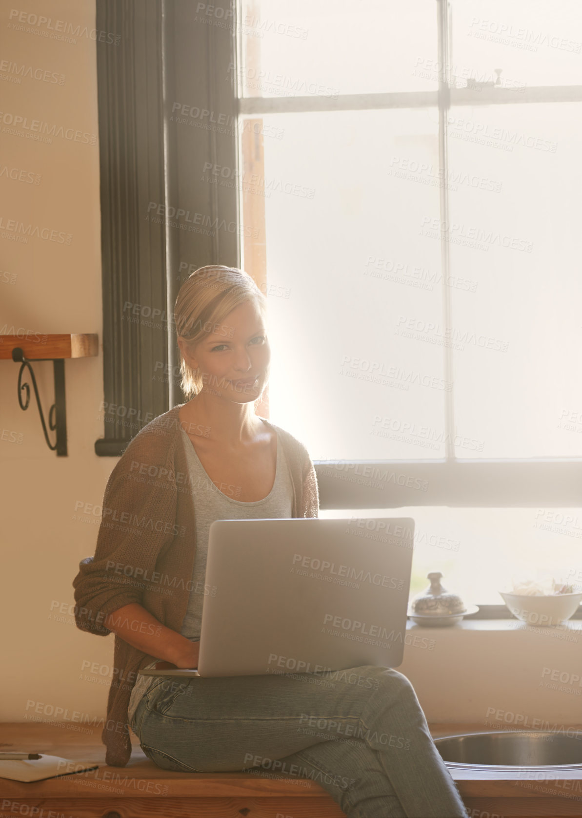 Buy stock photo Woman, freelancer and laptop in portrait, remote work and internet connection in kitchen for info. Female person, editor and website for research or online news, blog and typing an article on tech