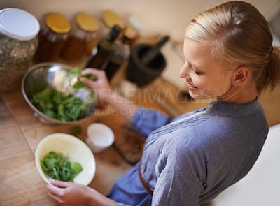 Buy stock photo Cooking, woman and salad in a home with diet, nutrition and healthy food with smile from above. Kitchen, bowl and leaves for organic and vegan lunch with bowl and wood board in a house with wellness