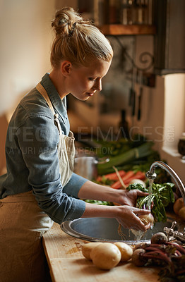 Buy stock photo Washing, vegetables and woman with healthy food for hygiene, cooking or preparation by sink in kitchen. Person with water and green onion to start meal, dinner or organic vegan and vegetarian lunch