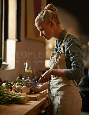Buy stock photo Cooking, woman and vegetables with knife in home with diet, nutrition and food with turnip. Kitchen, green and health from organic and vegan lunch with ingredients and wood board with wellness