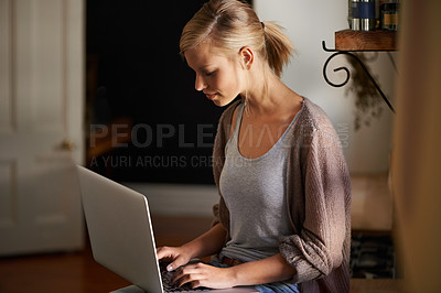 Buy stock photo Woman, freelancer and laptop for networking, remote work and internet connection in kitchen for info. Female person, editor and website for research or online news, blog and typing an article on tech