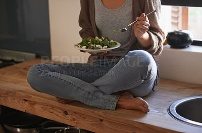 Buy stock photo Person in kitchen, eating food and nutrition with salad for health, lunch and wellness at home. Meal prep, hungry for vegetables and chicken with vitamins, sit on table with plate and fork for diet