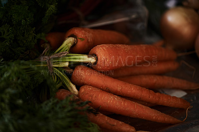 Buy stock photo Closeup, carrot and food for health and cooking, wellness and nutrition with vegan or vegetarian meal prep. Orange vegetables, organic produce and cuisine with dinner or lunch ingredients for diet