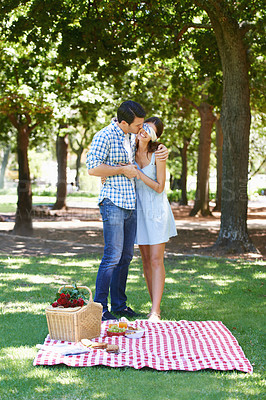 Buy stock photo Date, picnic and surprise with couple in park for romance, bonding and summer vacation. Happiness, commitment and relax with man and woman in love in nature for blindfold, support and relationship