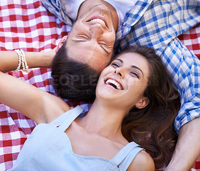 Buy stock photo Relax, love and happy with couple and picnic in park for romance, valentines day and date together. Smile, calm and vacation with man and woman laughing on blanket for summer, bonding and peace