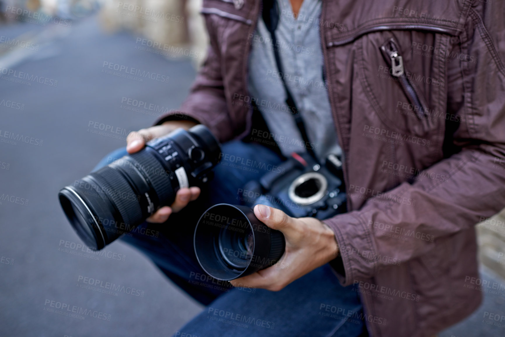 Buy stock photo Camera lens, outdoor and hands of photographer to work in city on photoshoot with professional gear to film on street. Shooting, photography and cameraman closeup with tech to capture media in town