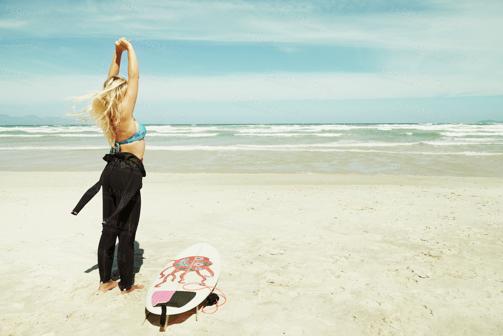 Buy stock photo Sports, stretching and woman on beach with surfboard for travel, vacation or holiday on tropical coast. Earth, nature and sky with surfer on sand by sea or ocean for hobby or leisure from back