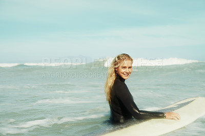 Buy stock photo A female surfer in the ocean