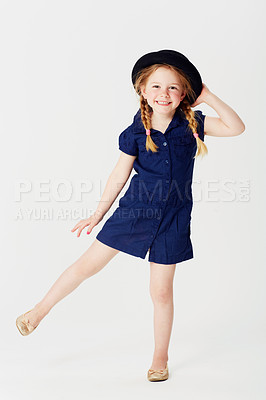 Buy stock photo Full length studio portrait of an adorable little girl wearing a hat