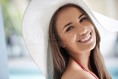 Buy stock photo Relax, portrait and happy woman at pool with hat, sunshine and travel for summer holiday at hotel. Smile, water and face of girl on luxury vacation with adventure, weekend and swimming in sun in USA.