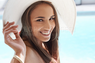 Buy stock photo Smile, portrait and woman at pool with hat, sunshine and and travel for summer holiday at hotel. Relax, water and face of happy girl on luxury vacation with adventure, weekend and swimming in sun
