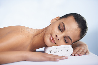 Buy stock photo Relax, sleeping and woman at spa with self care, wellness and luxury skin treatment for zen. Calm, cosmetics and young female person with beauty body routine taking nap on towel at health salon.