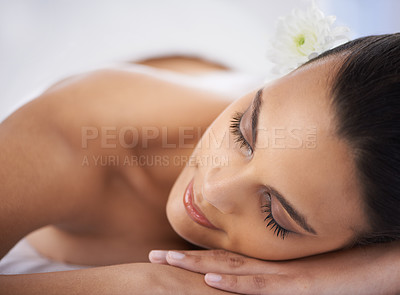 Buy stock photo Relax, nap and woman at spa with self care, wellness and luxury skin treatment for zen. Calm, cosmetics and young female person with beauty body routine sleeping on towel at health salon for peace.