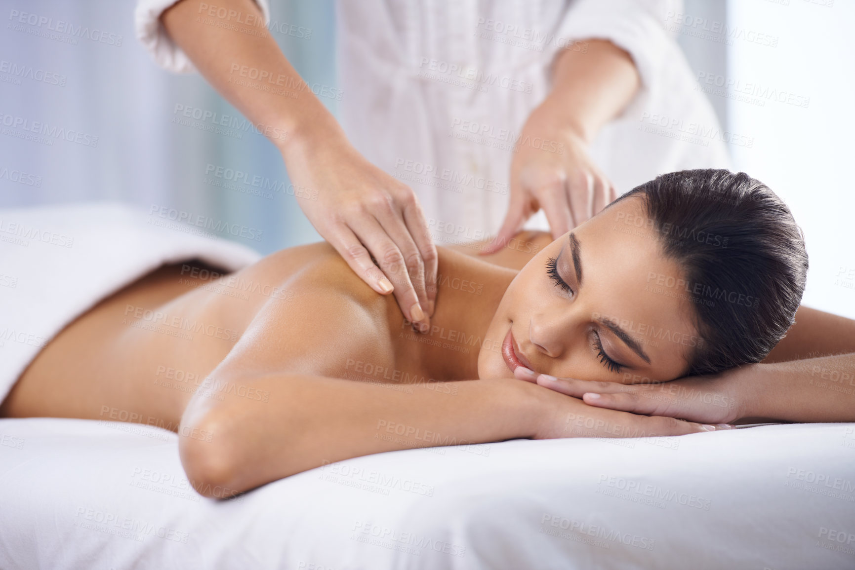 Buy stock photo Cropped shot of a beautiful young woman relaxing during spa treatment