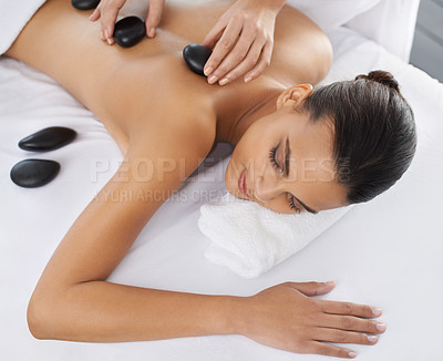 Buy stock photo Cropped shot of a beautiful young woman relaxing during spa treatment