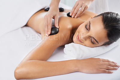 Buy stock photo Cropped shot of a beautiful young woman relaxing during spa treatment