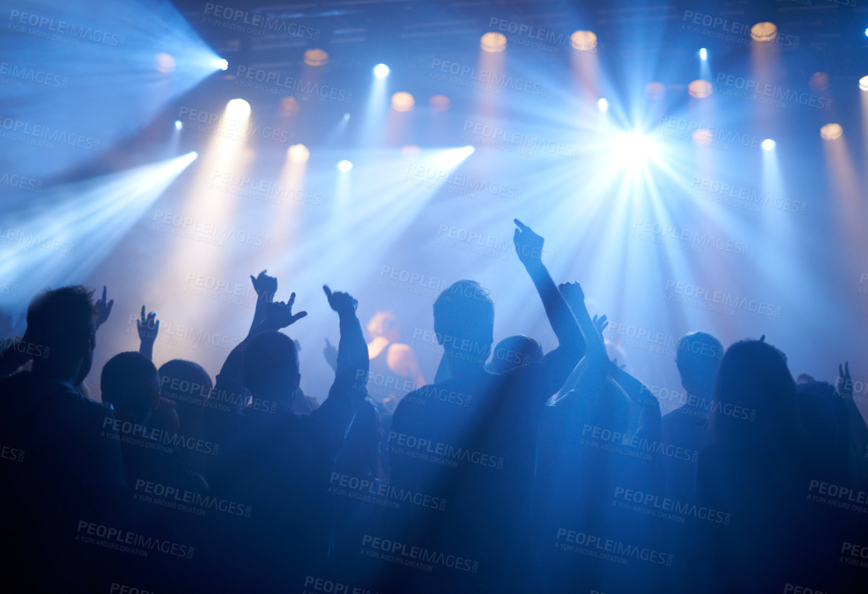 Buy stock photo Shot of adoring fans at a rock concert