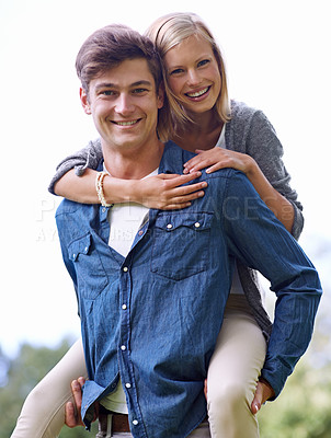 Buy stock photo Portrait, smile and piggyback with couple in countryside together for love, romance or bonding. Happy, date or hugging with young man carrying woman outdoor in nature for hiking or adventure