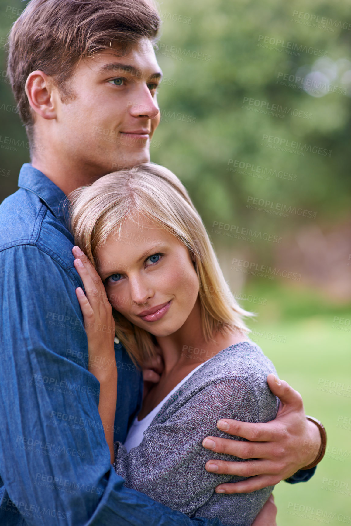 Buy stock photo Man, woman and hug with portrait in garden, park and happy for care, bonding and love in spring. Couple, people and embrace with connection in by grass lawn with smile for relationship in Los Angeles
