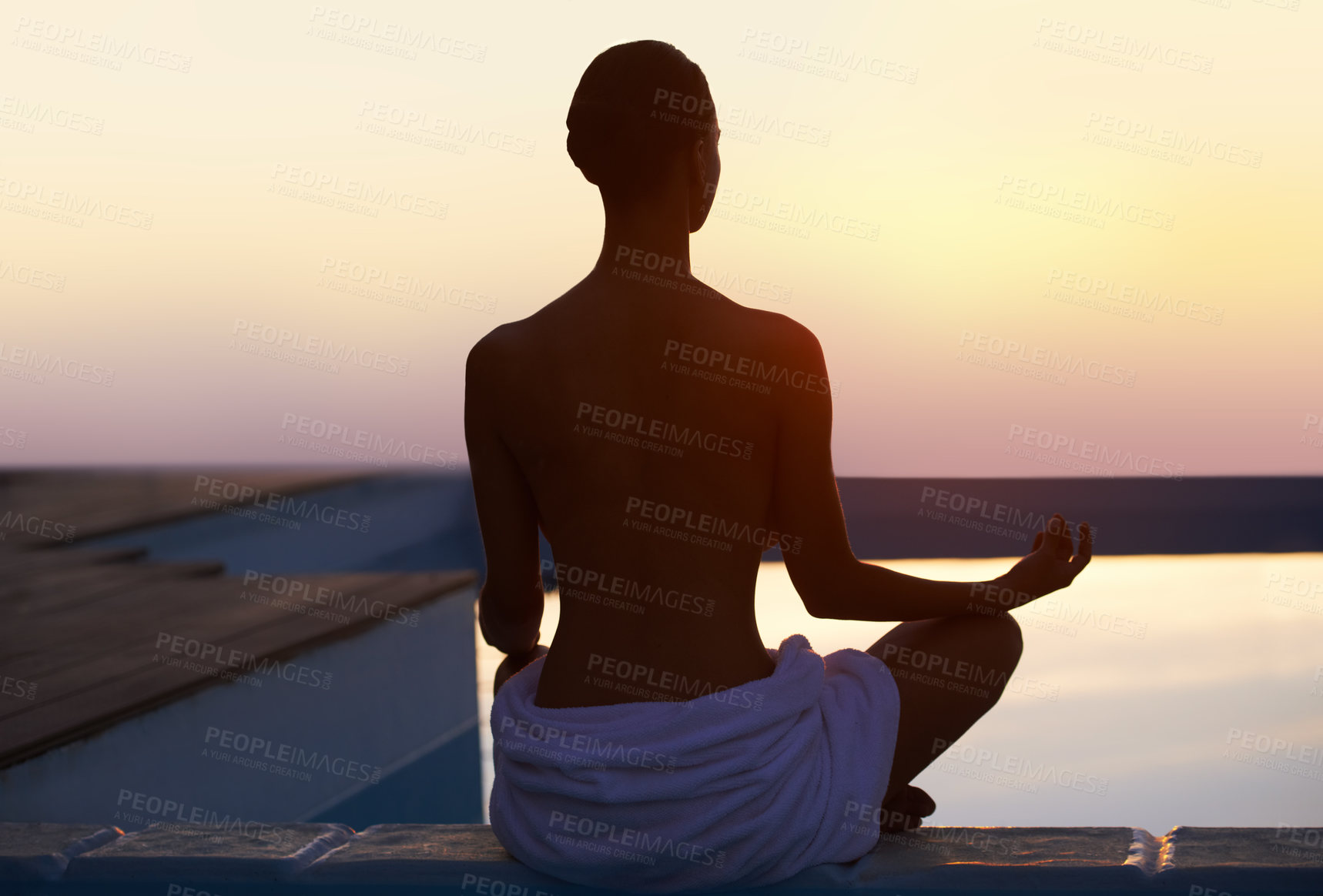 Buy stock photo Back, yoga and woman meditate at sunset by swimming pool for healthy body, wellness and zen outdoor on mockup space. Rear view, lotus pose and silhouette of person at twilight to relax, peace or calm
