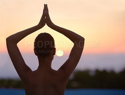 Buy stock photo Vrikshasana, yoga and woman meditate at sunset for healthy body, wellness and zen for mindfulness outdoor. Rear view, tree pose and person at twilight to relax, peace or calm to balance for exercise