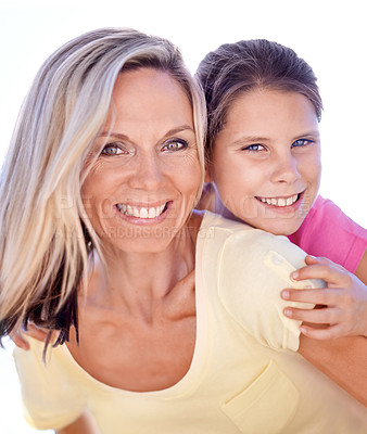 Buy stock photo Mother, girl child or portrait with piggyback in studio for bonding, support or hug on holiday with smile. Family, woman and daughter with face, happy or embrace with love or care on white background
