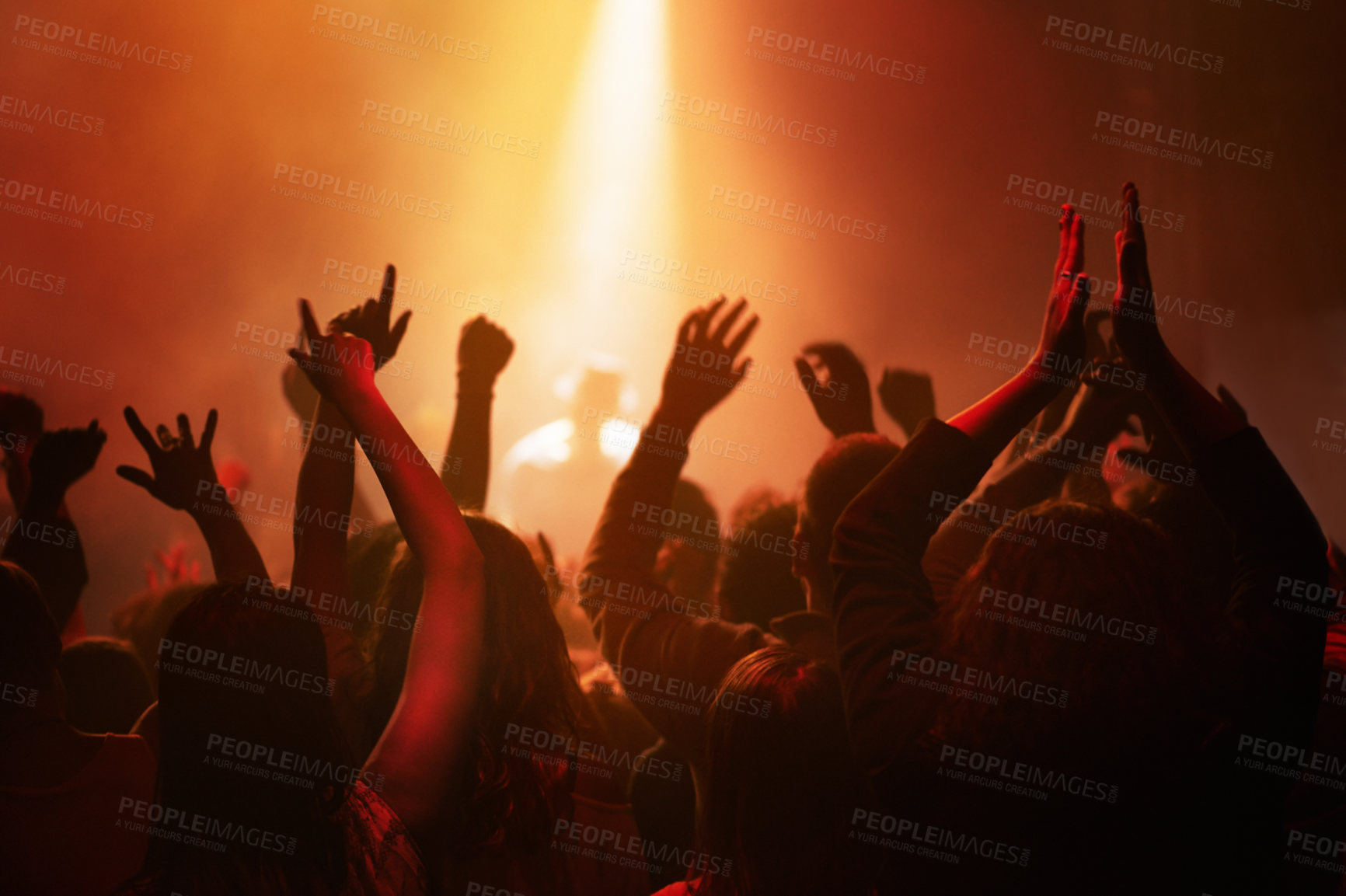 Buy stock photo Hands of people in crowd dancing at concert or music festival, neon lights and energy at live event. Dance, applause and group of excited fans in silhouette at rock band performance with lighting.