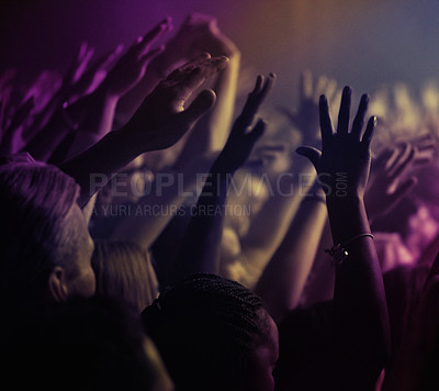 Buy stock photo Hands, lights and people at rock concert or music festival with neon lighting, energy and dancing at live event. Dance, fun and group of excited fans in arena at band performance or crowd at party.