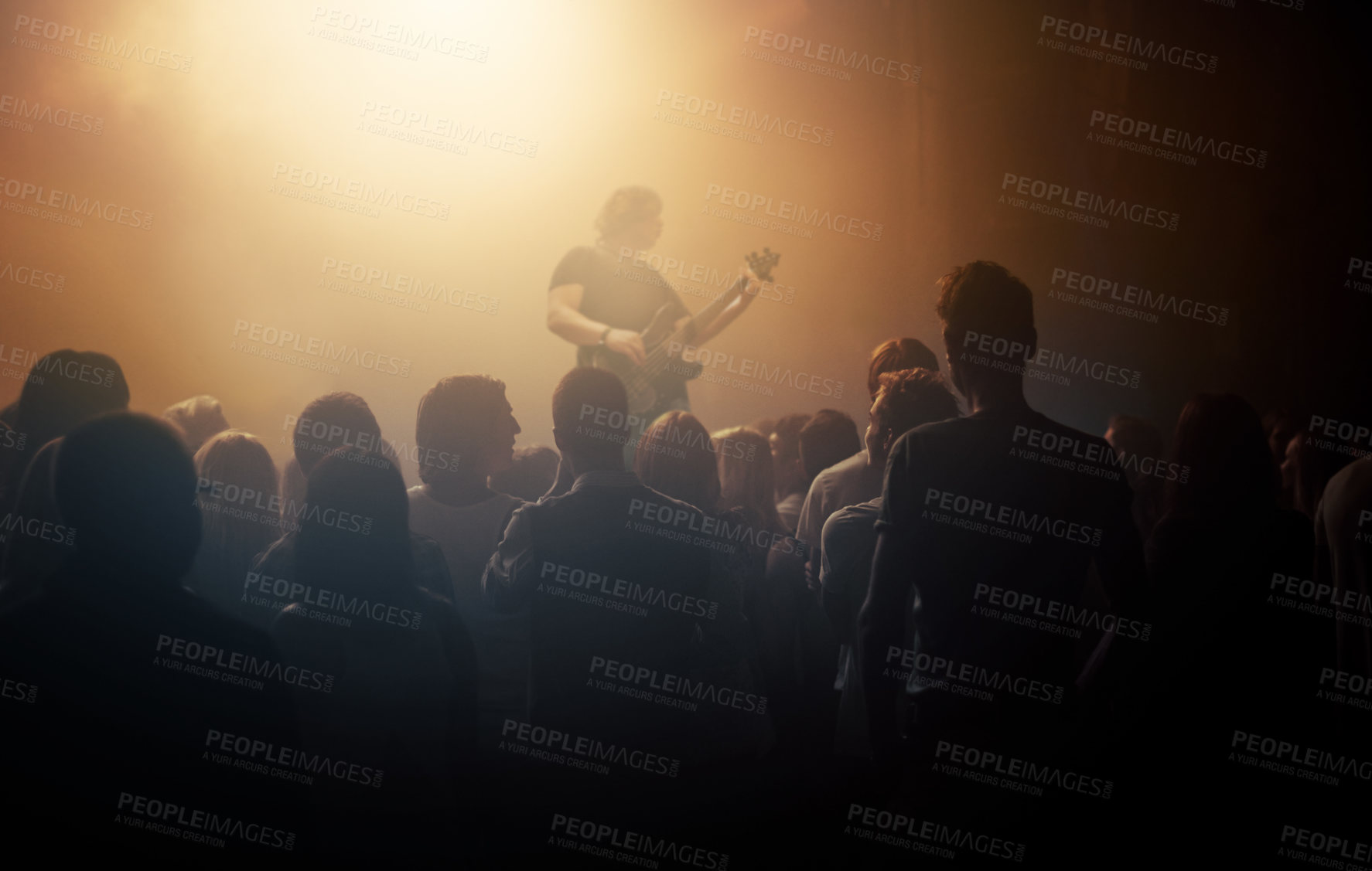 Buy stock photo Dark crowd, musician and people at a concert for a guitar performance, music festival and band. Event, show and an audience enjoying live night entertainment, performer or an artist at a club