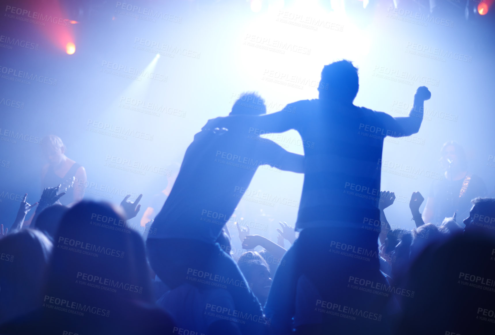 Buy stock photo Rock concert, celebration and party crowd with lighting and people back with dancing. Silhouette, audience and night festival event with performance and group listening and watching a band music