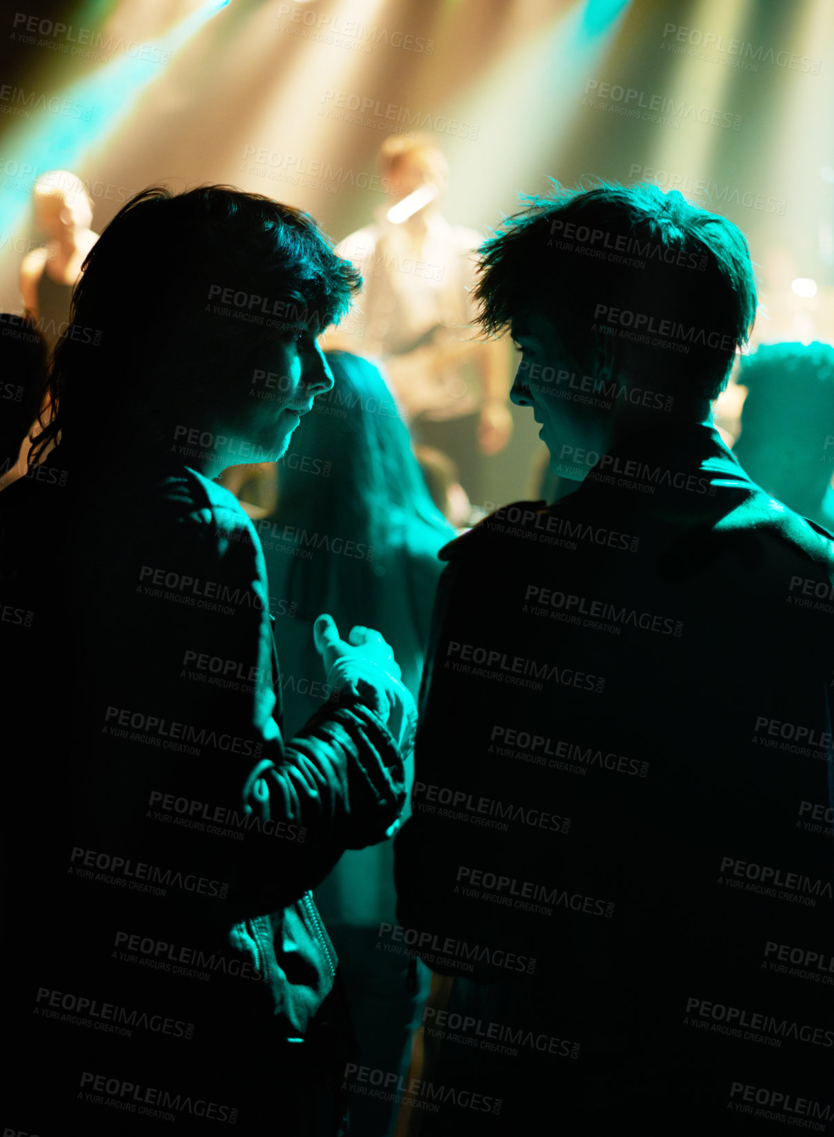 Buy stock photo Neon, friends and fans at music festival, lights and crowd in silhouette at live band performance on stage. Happiness, excited people and discussion with lighting, excitement at rock concert together