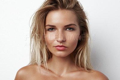 Buy stock photo Cropped head and shoulders portrait of a sensual young blonde woman