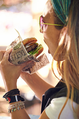 Buy stock photo Face, fast food and woman eating burger closeup outdoor for hunger, takeaway or craving in summer. Hamburger, lunch or snack with head of hungry young person biting a beef bun for cuisine or meal