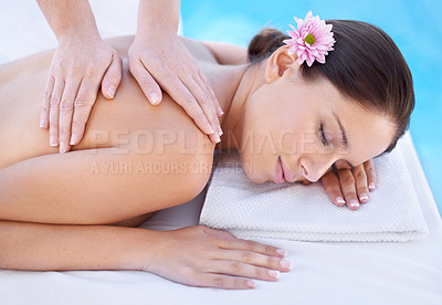 Buy stock photo Relax, massage and woman at spa pool with flower for health, wellness and luxury holistic treatment. Self care, peace and girl on table with masseuse for body therapy, sleep and calm hotel service