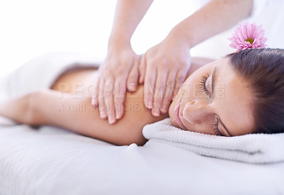 Buy stock photo Relax, massage and woman at hotel spa with flower for health, wellness and luxury holistic treatment. Self care, peace and girl on table with masseuse for body therapy, sleep and calm service.
