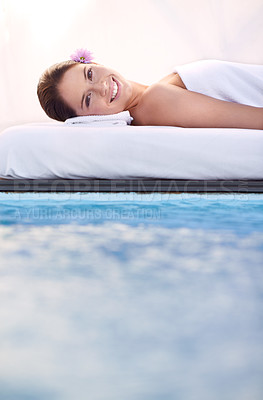 Buy stock photo Massage, portrait and woman at spa poolside for health, wellness and luxury holistic treatment. Self care, peace and face of girl on pool bed for body therapy, comfort and calm hotel service to relax