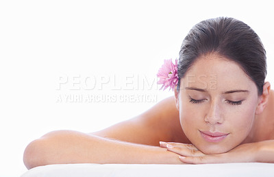 Buy stock photo An attractive young woman lying down during relaxing spa day