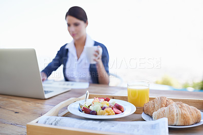 Buy stock photo Food, laptop and breakfast outdoor, woman and table with healthy meal, freelancer and online. Person, worker and writing  with technology, pc and creative with coffee in remote work and business
