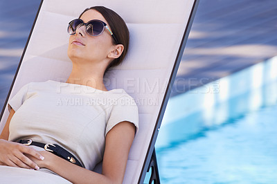 Buy stock photo Hotel, swimming pool and woman in lounge chair to relax on vacation, business trip or morning break. Travel, hospitality and businesswoman at poolside with sunshine, luxury or villa holiday lifestyle