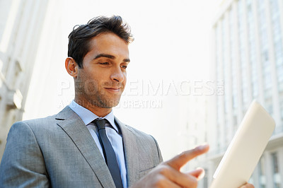 Buy stock photo Smile, tablet and businessman in city scroll on social media, app or the internet for communication. Happy, research and professional lawyer reading blog on website with digital technology in town.