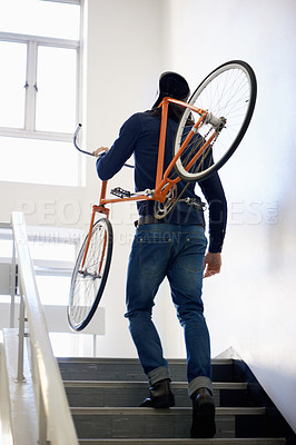 Buy stock photo Bicycle, stairs and man with back carrying bike for healthy and eco friendly transportation for travel. Staircase, carry and cyclist with apartment building, take up and journey of walking steps