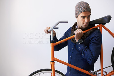 Buy stock photo Man, studio and bicycle for sustainability, transportation or exercise on white background. Hipster cyclist, carbon neutral and eco friendly travel for environmental commute or fitness and trip